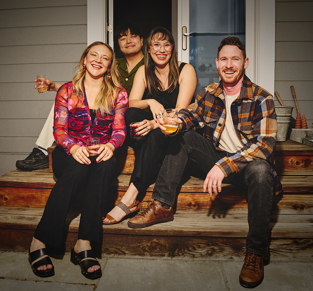 Offscript winemaking team sitting on a porch together.